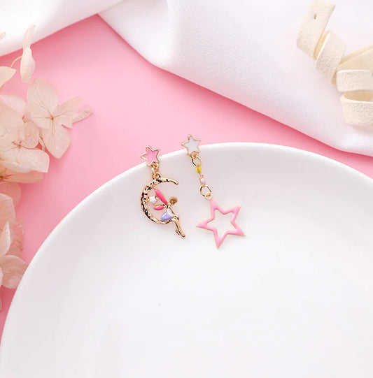 Asymmetric Earrings with Star and Moon Design in Pink